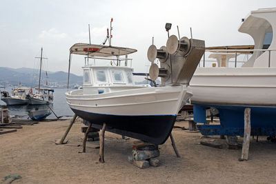 A wooden boat on the lift in a shipyard in bodrum, turkey