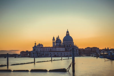 Basilica of santa maria della salute in venice seen at sunset with no one in the grand canal 