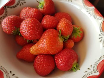 Close-up of strawberries in plate on table