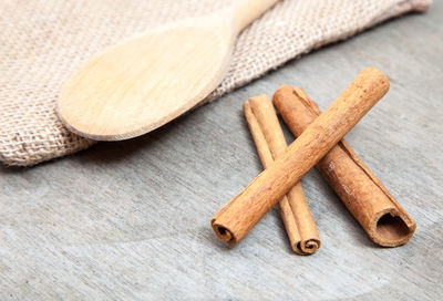 Close-up of knife on wooden table