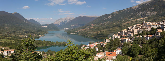 High angle view of town by river