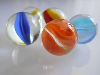 High angle view of multi colored balls on table