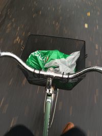 High angle view of bicycle in basket on sunny day