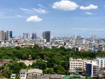 Buildings in city against sky