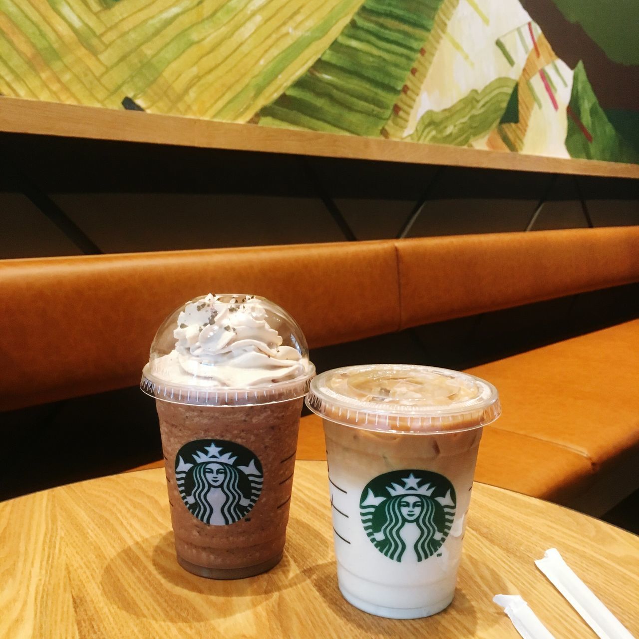 table, indoors, food and drink, drink, refreshment, no people, potted plant, high angle view, frothy drink, wood - material, coffee - drink, freshness, leaf, latte, day, close-up, food, froth art