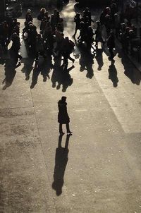 Woman standing on city street