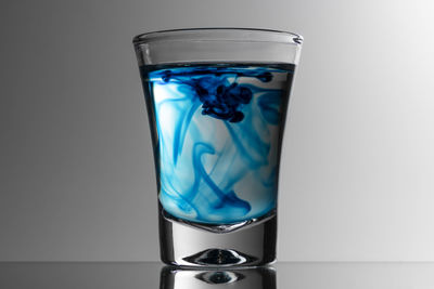 Close-up of glass of water on table