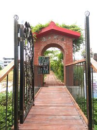 Footbridge over wooden walkway