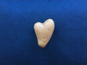 Close-up of heart shape over white background