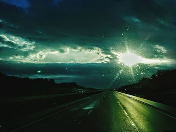 Road against cloudy sky