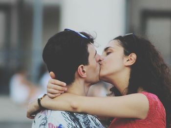 Close-up of couple kissing on mouth