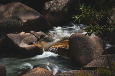 Scenic view of rocks at sea shore