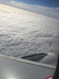 Cropped image of airplane wing