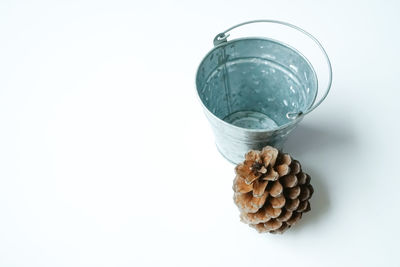 High angle view of drink in glass jar on white background