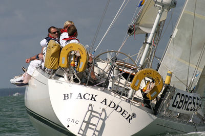 People on ship sailing in sea