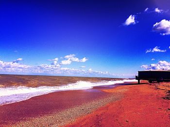 Scenic view of beach against sky