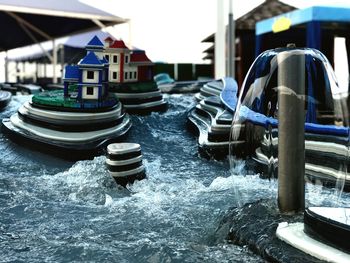 Boats moored on water