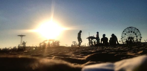 Silhouette of people on beach