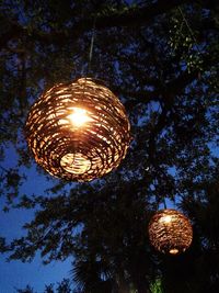 Low angle view of illuminated light bulb