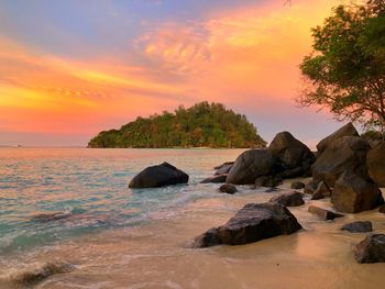 Scenic view of sea against sky during sunset