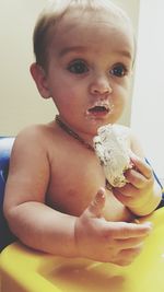 Portrait of boy eating ice cream