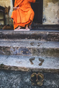 Low section of people standing on staircase