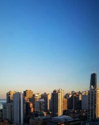 View of cityscape against clear sky