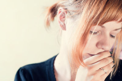 Close-up portrait of young woman