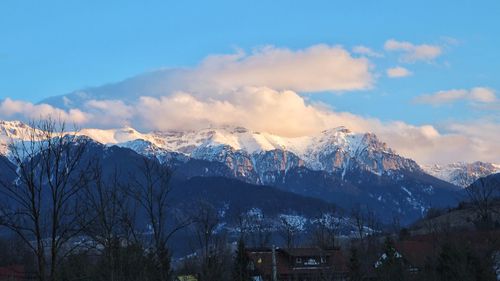 Scenic view of snowcapped mountains against sky