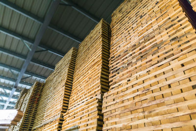 Wood flooring planks stored in wood processing factory