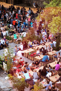 High angle view of people sitting outdoors