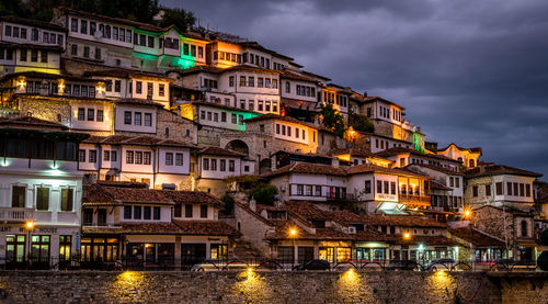 Illuminated buildings in city at night