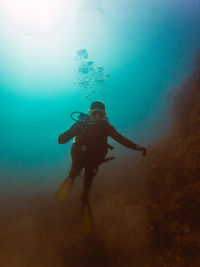 Man swimming in sea