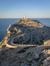 Scenic view of lighthouse of cap de formentor on majorca mallorca at sunset against sky