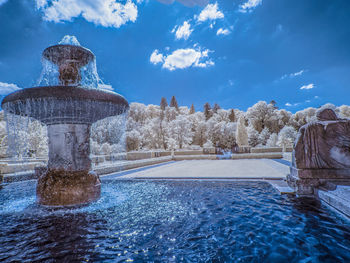 Scenic view of frozen lake against sky during winter