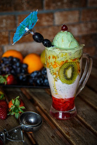 Close-up of drink served on table