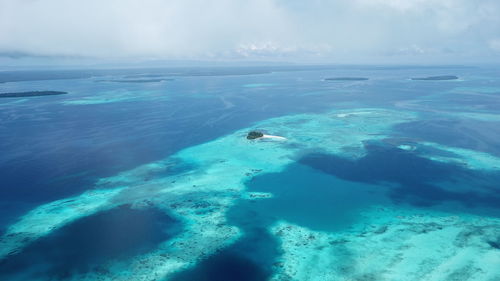 Aerial view of sea against sky