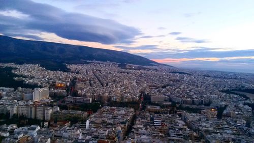 Aerial view of cityscape against sky