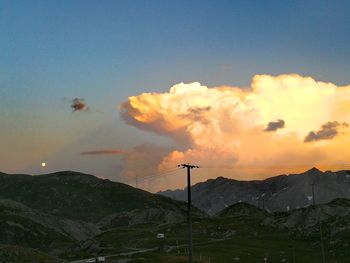 Scenic view of mountains against sky during sunset