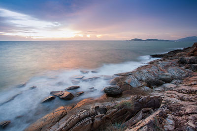 Scenic view of sea against sky during sunset