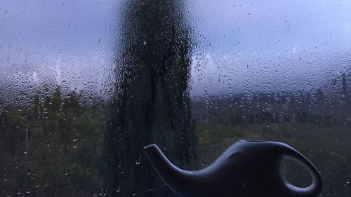 Close-up of wet window in rainy season