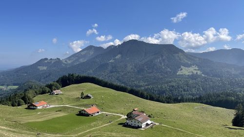 Scenic view of landscape and mountains against sky