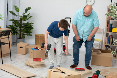 Side view of man working at home