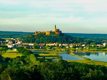 Scenic view of town against sky