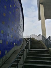 Low angle view of staircase against sky