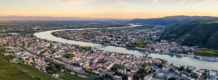High angle view of cityscape against sky during sunset