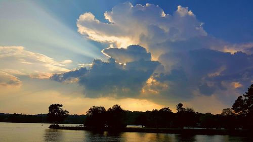 Scenic view of lake at sunset