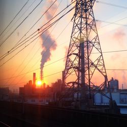 Silhouette of city at sunset