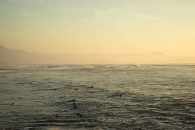 Scenic view of sea against sky during sunset