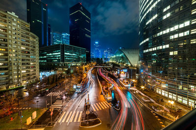 Light trails on city street at night